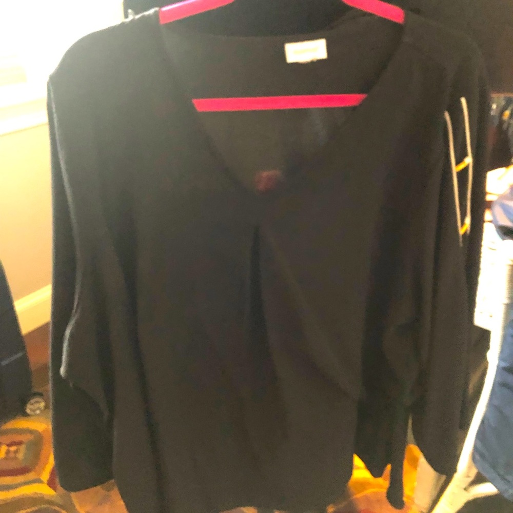 Black top with gold trim sleeves